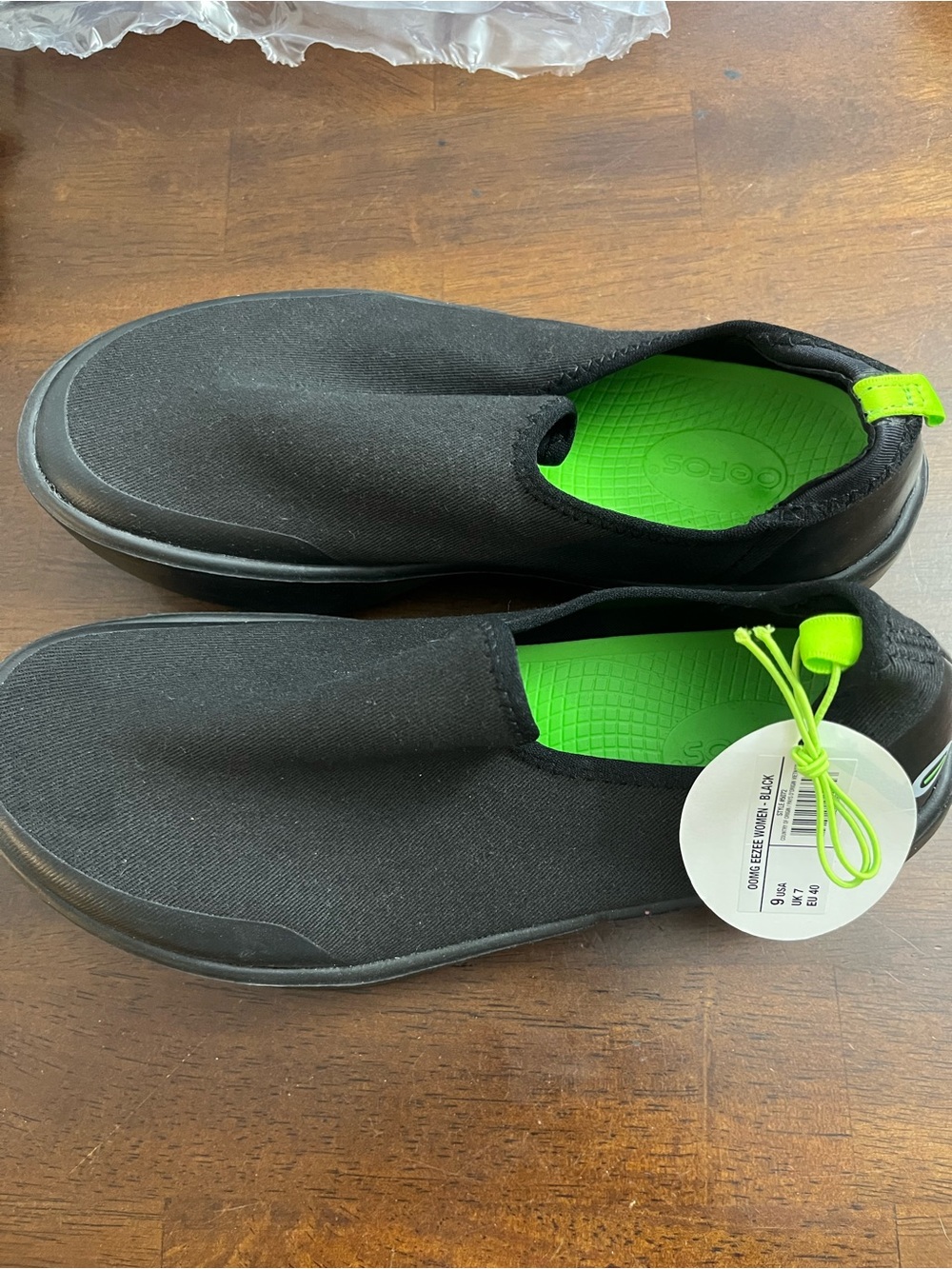 Slip-On women’s size 9 Oofos Casual Sneakers in Black with Neon Green Insole